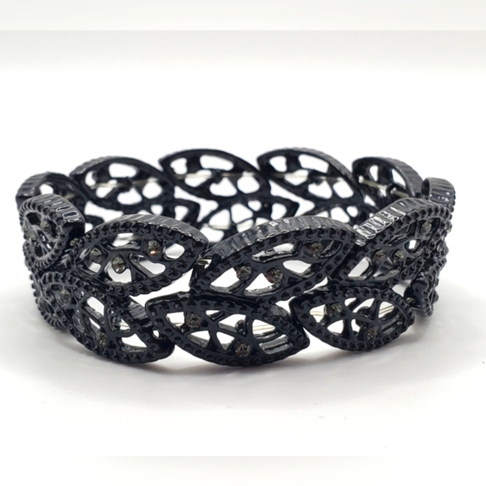 Elegant Black and Silver Bracelet with Intricate Metalwork